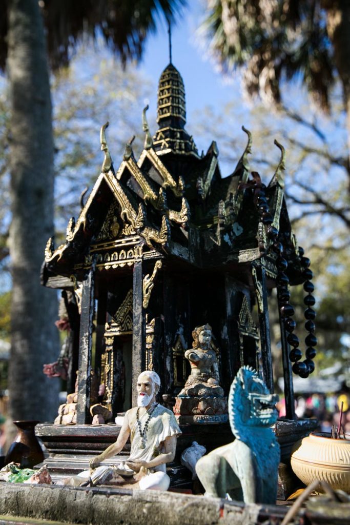 An outside altar at the Wat Mongkolratanaram, photographed by NYC photojournalist, Kelly Williams