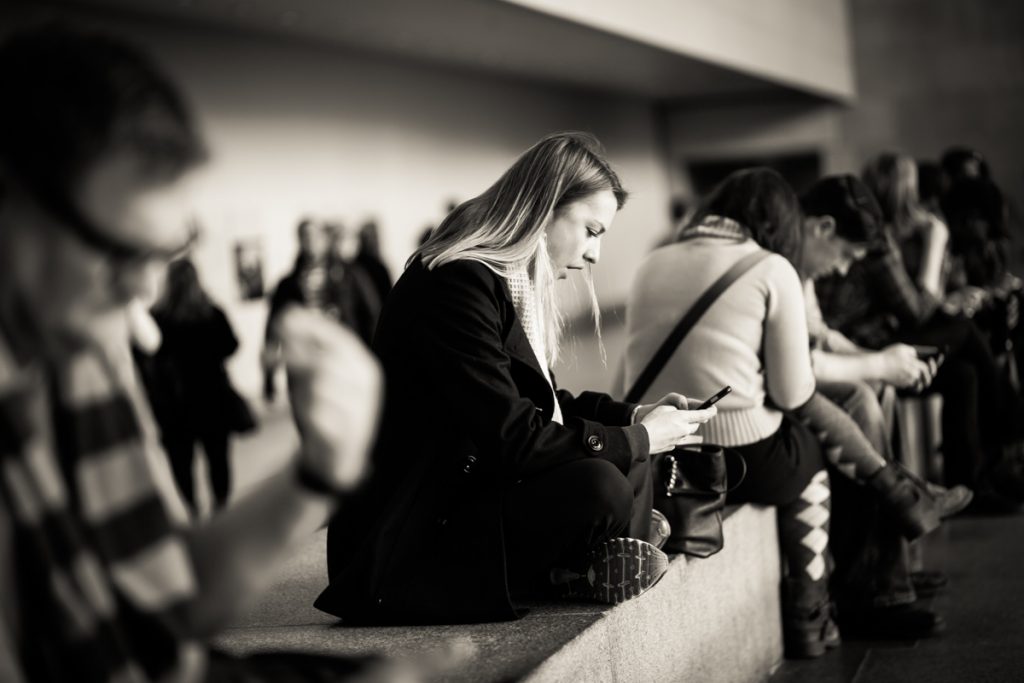 Candid shot of a museum goer at the Metropolitan Museum of Art, by NYC street photographer, Kelly Williams