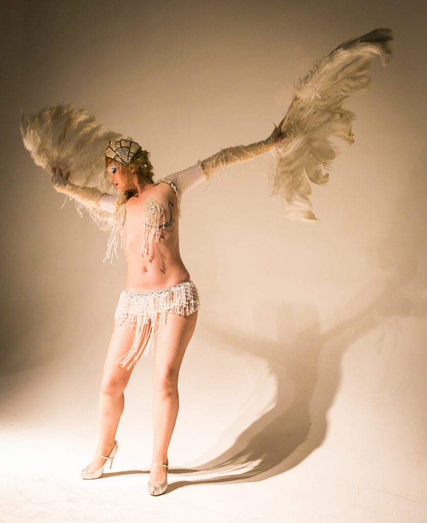 Ms. Tickle performing at the Atlas Obscura burlesque history lecture and cabaret performance