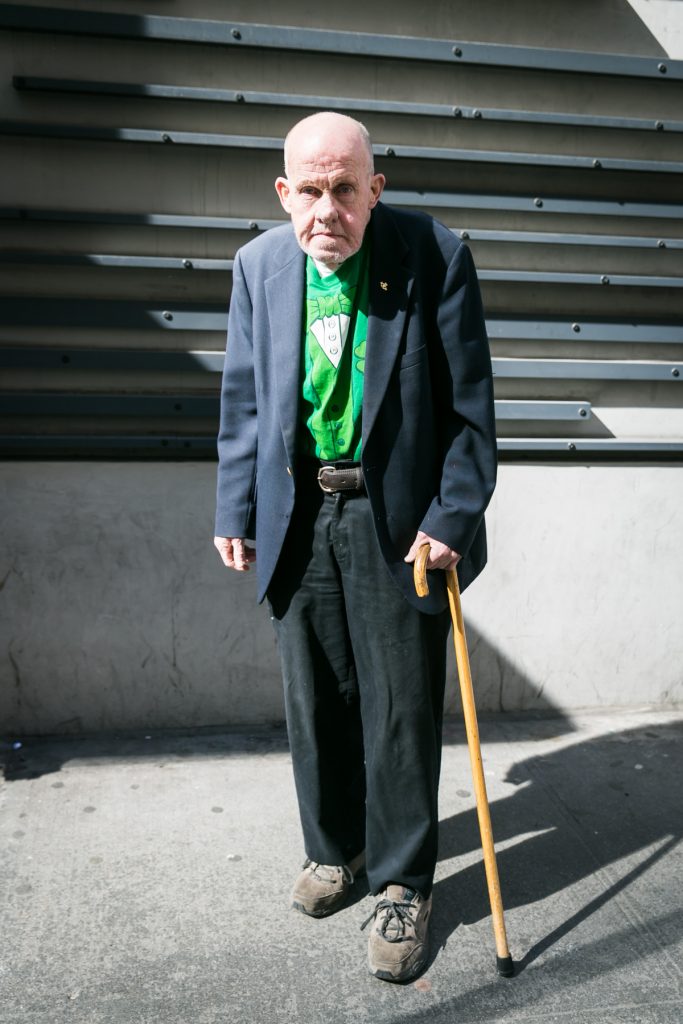 Old man at the 2016 St. Patrick's Day Parade in NYC by photojournalist, Kelly Williams