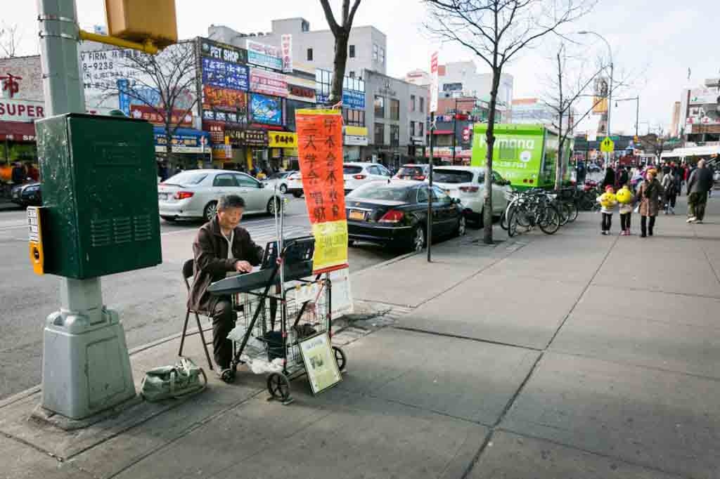Piano player on the sidewalk in Flushing Queens street photography series