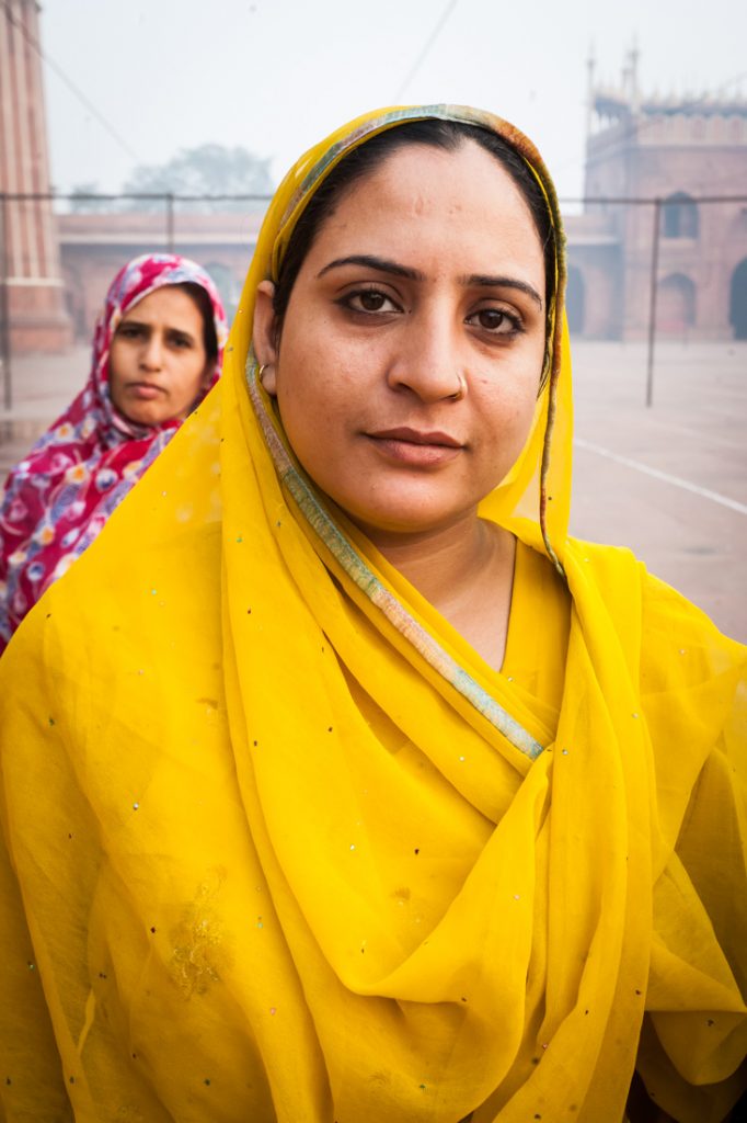 Woman in a yellow sari in Delhi, India