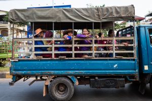 Women traveling by truck for an article on Siem Reap travel tips