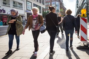 Women walking down street in Hamburg, Germany