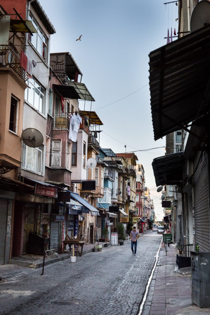 Man walking in the street for an article on Istanbul street photos