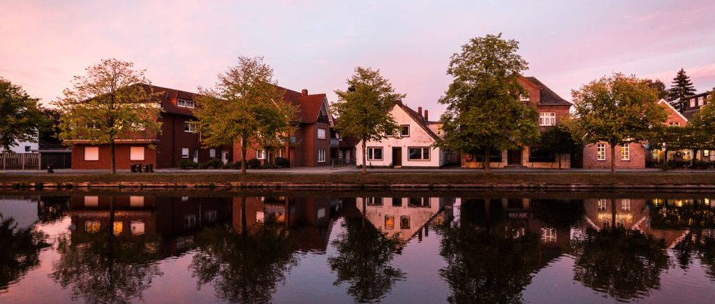 Houses on a canal in Papenburg, Germany at sunset