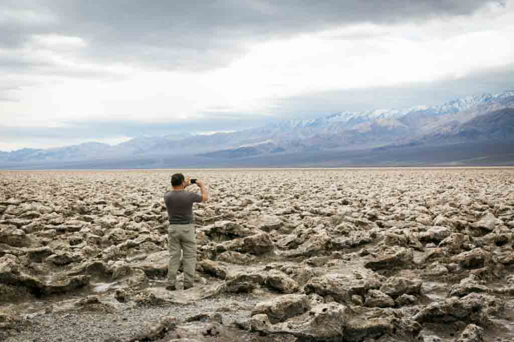 Tourist in Badwater, Death Valley National Park