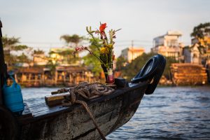 Flowers decorating a boat at the Cai Rang Floating Markets