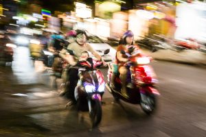 Blurry motorcycle for article on Ho Chi Minh City street photos