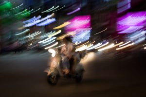 Blurry motorcycle for article on Ho Chi Minh City street photos