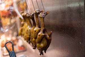 Peking ducks hanging for a Hong Kong travel guide article