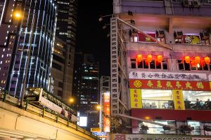 Subway train and Hong Kong city skyline for a Hong Kong travel guide article