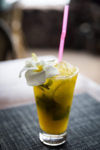 Tropical drink with flower for an Easter Island travel guide