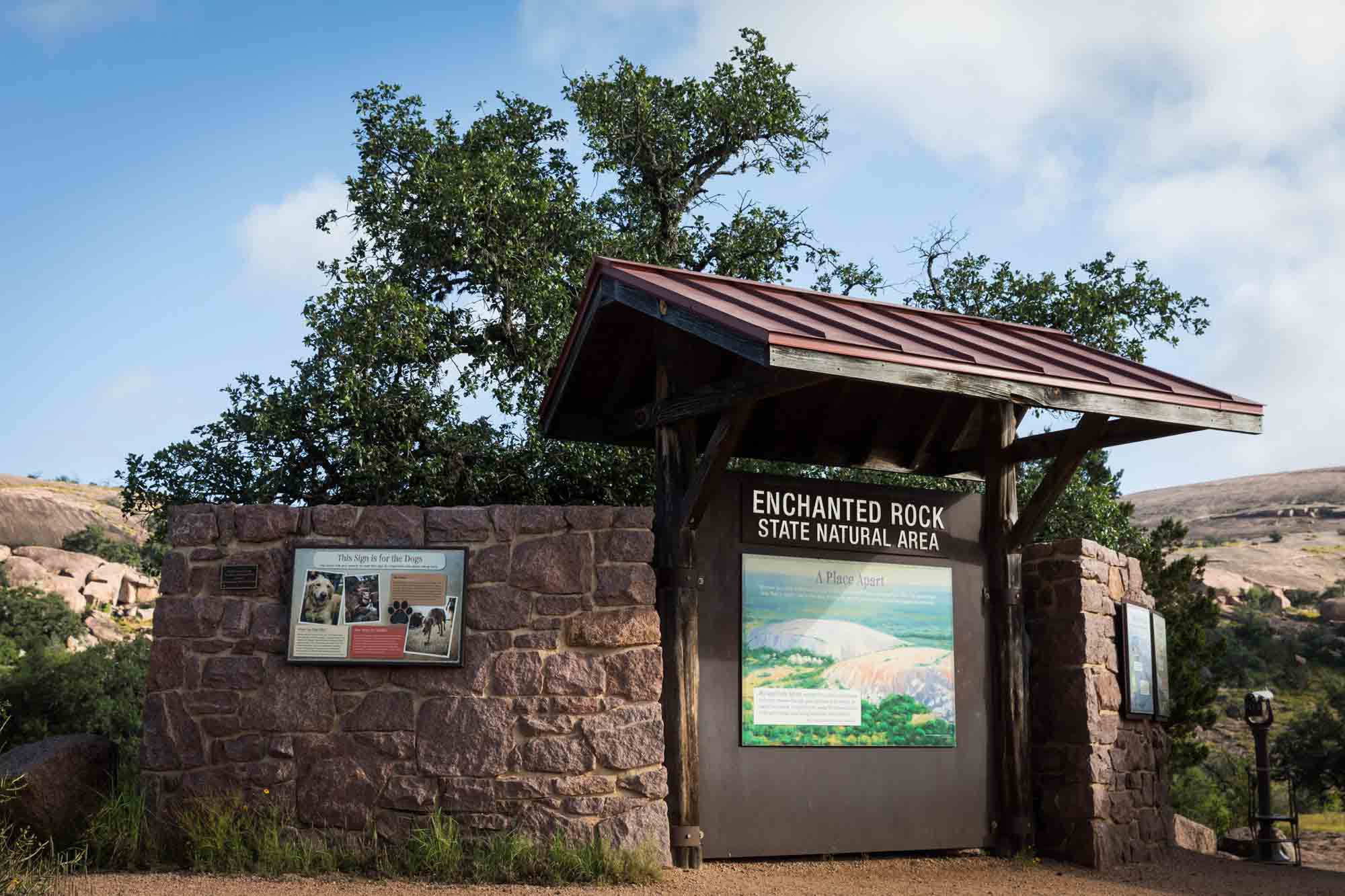 Enchanted Rock State Natural Area sign with maps for an article on Enchanted Rock hiking trips