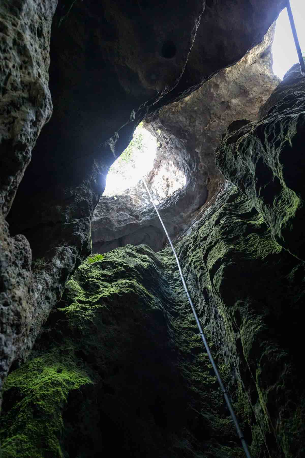 Hole in ceiling of Cascade Caverns for an article entitled, ‘Visiting Boerne, Texas: Everything You Need to Know’