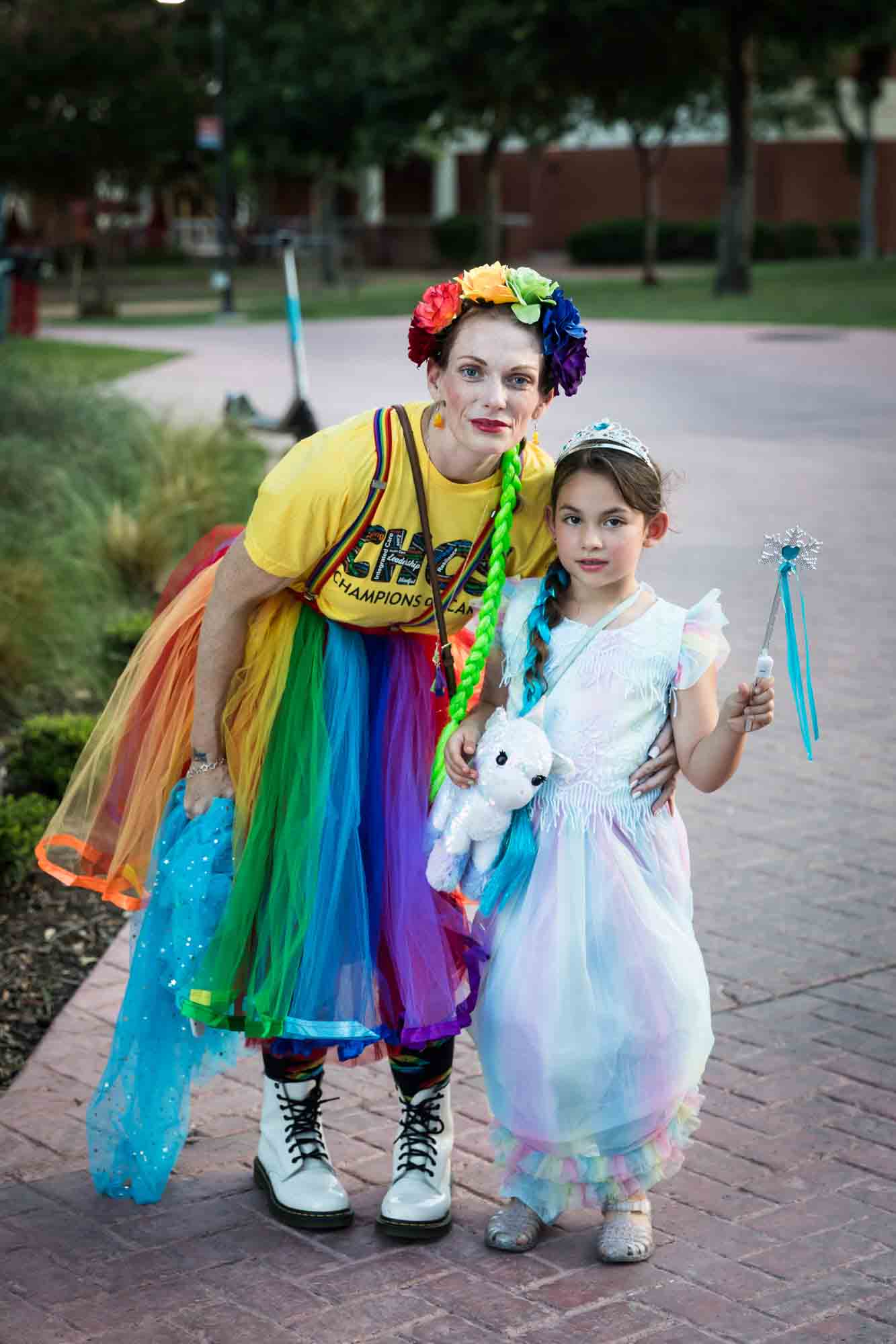 San Antonio gay pride parade photos of colorfully dressed mother and daughter dressed as princess