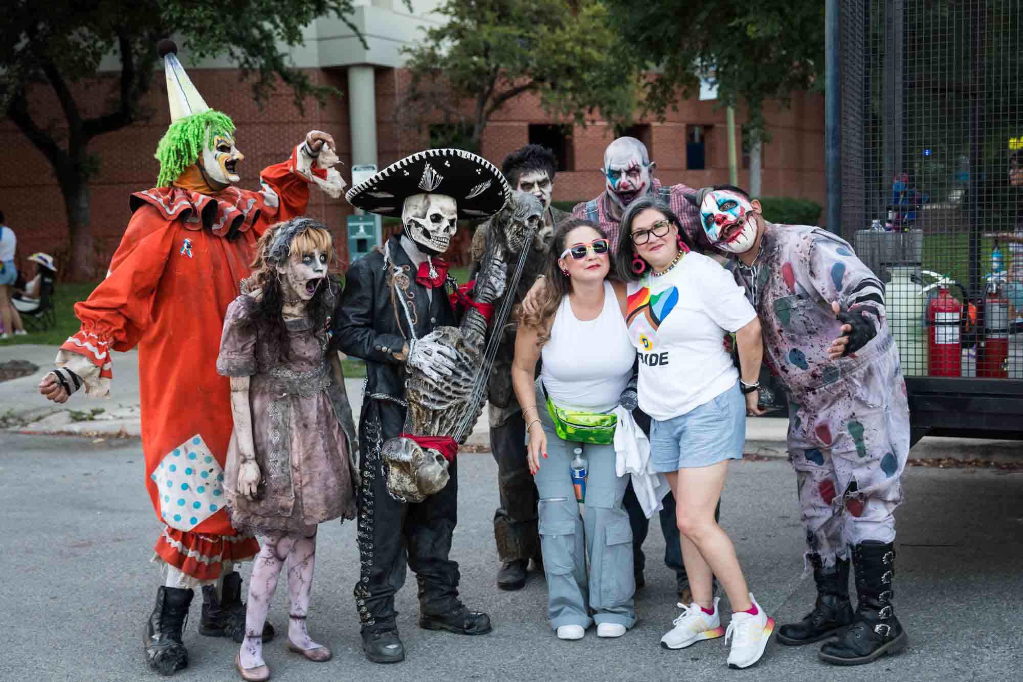 San Antonio gay pride parade photos of two women posing with horror movie characters