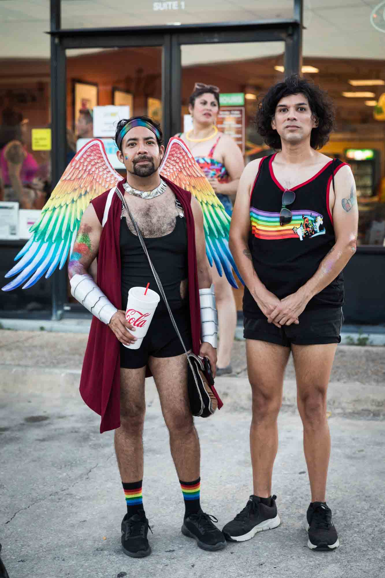 San Antonio gay pride parade photos of two colorfully dressed men