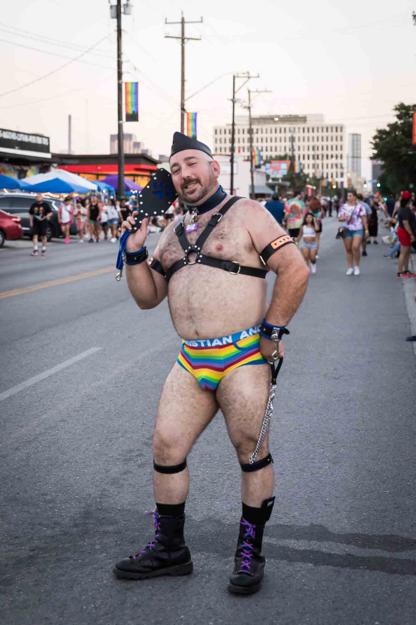 San Antonio gay pride parade photos of a nearly naked man wearing a unique outfit in the street