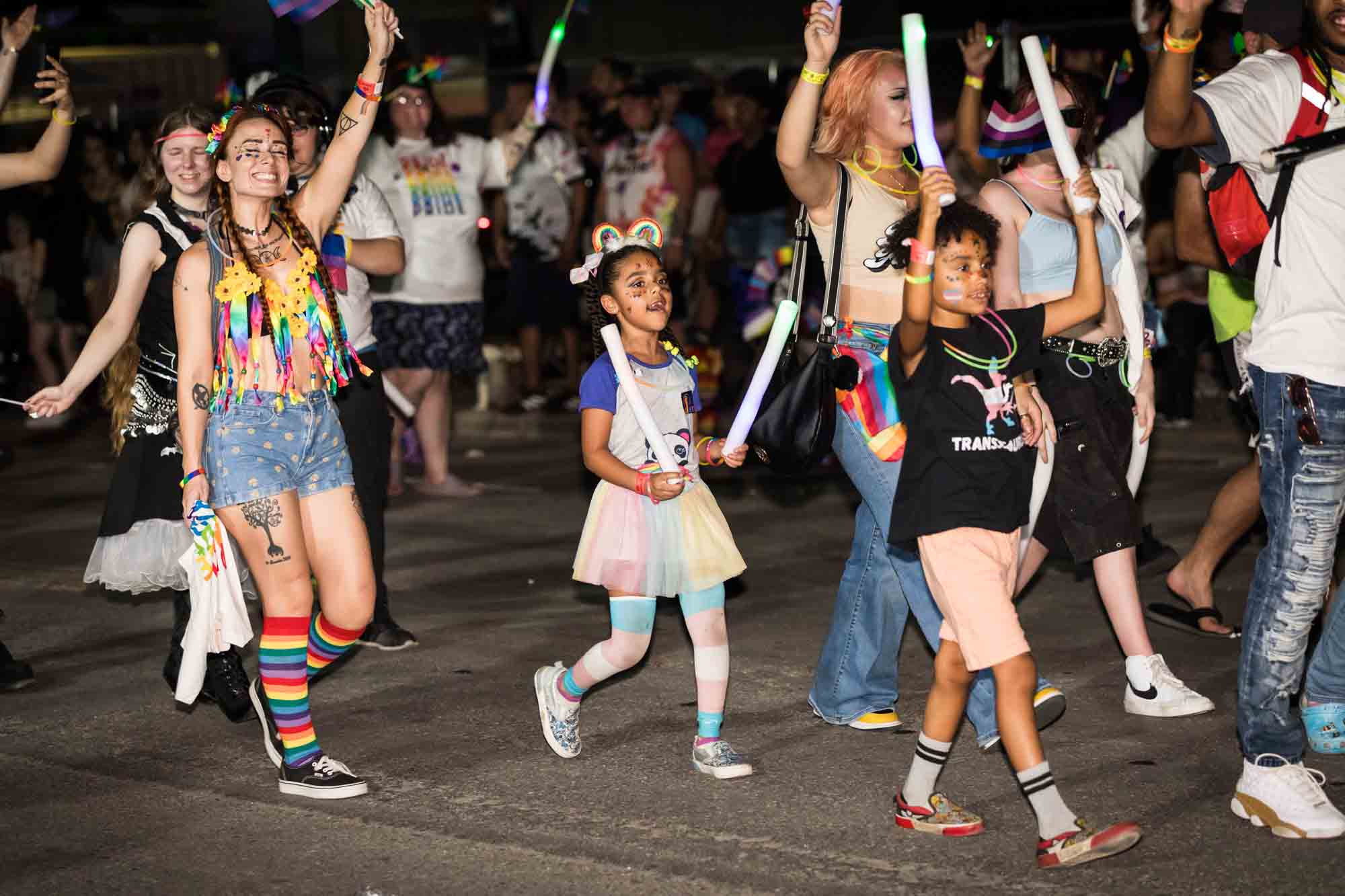 San Antonio gay pride parade photos of children and adults marching in parade